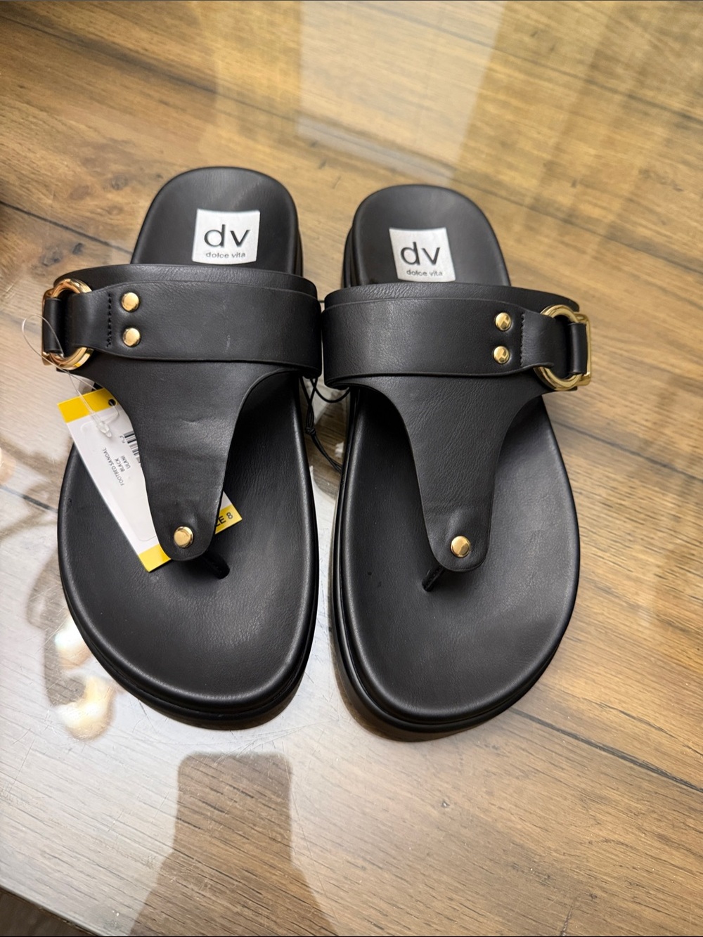 DV by Dolce Vita Black Leather Toe-Post Sandals with Gold Accents